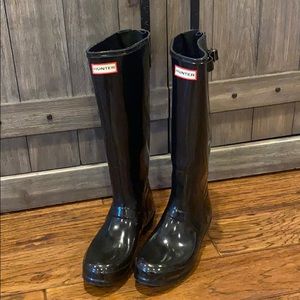 Hunter rain boots.